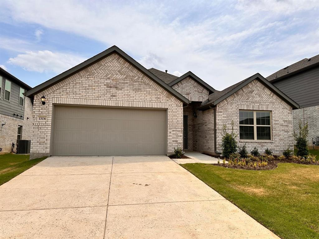 a front view of house with garage