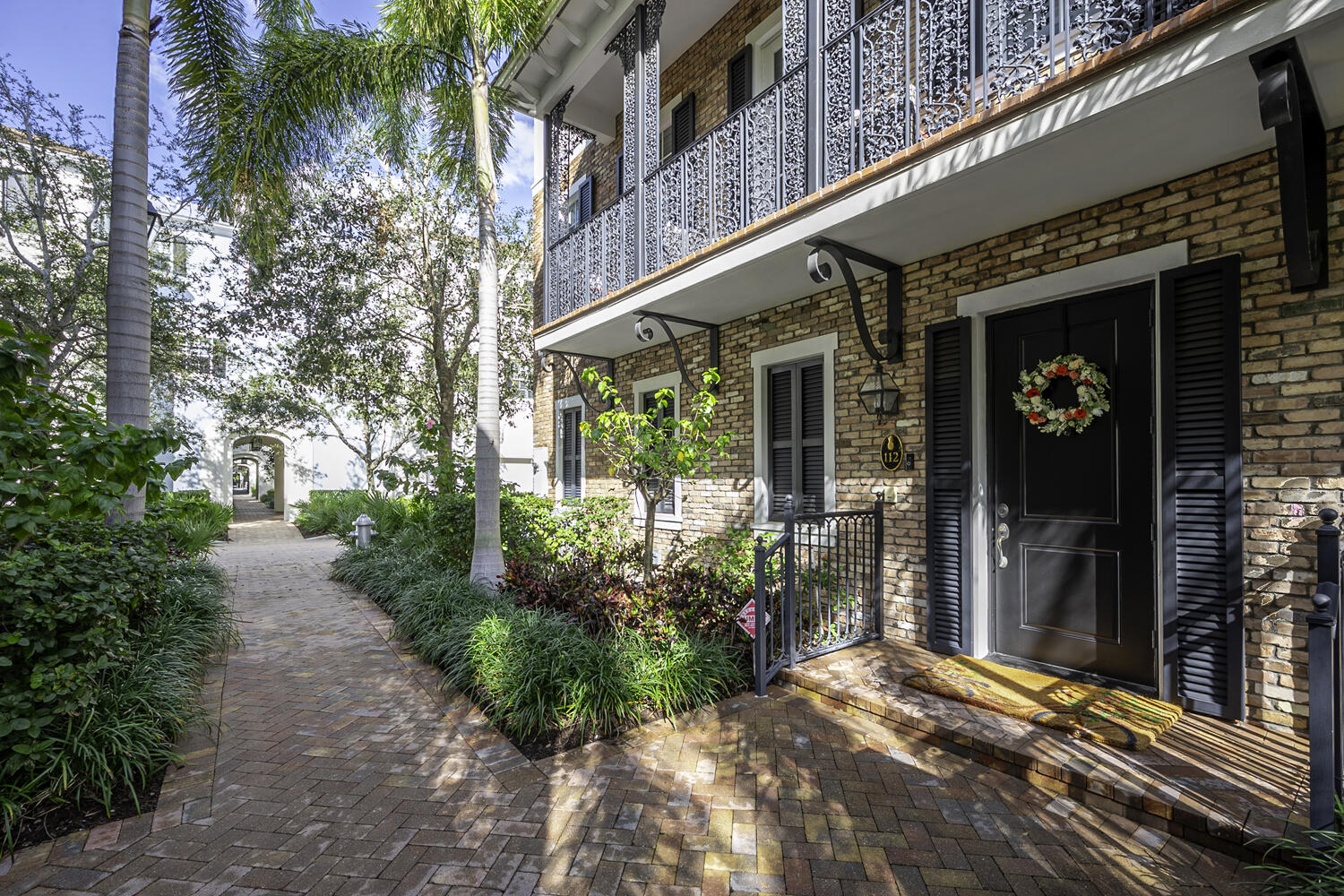 a view of a pathway with a house