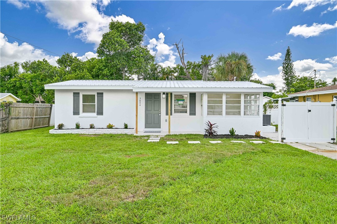 front view of a house with a yard