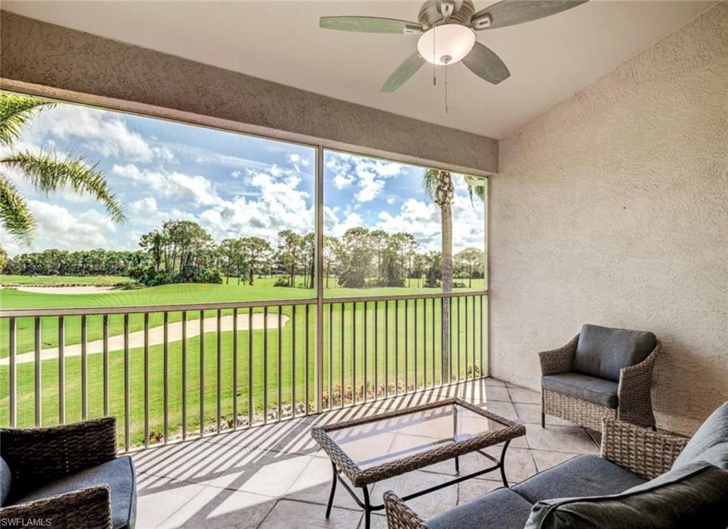 a view of a balcony with furniture