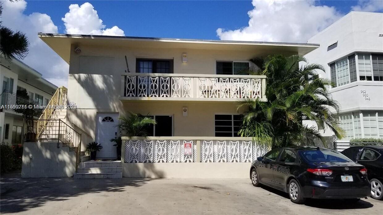 a front view of a house with a garage