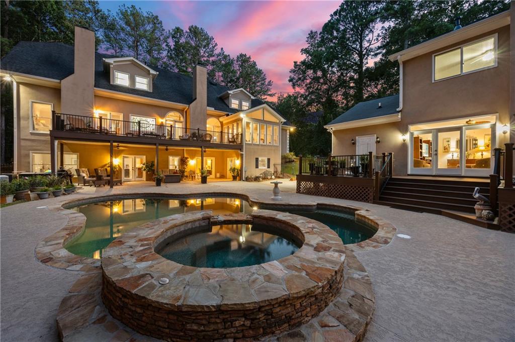 a view of a swimming pool with a patio