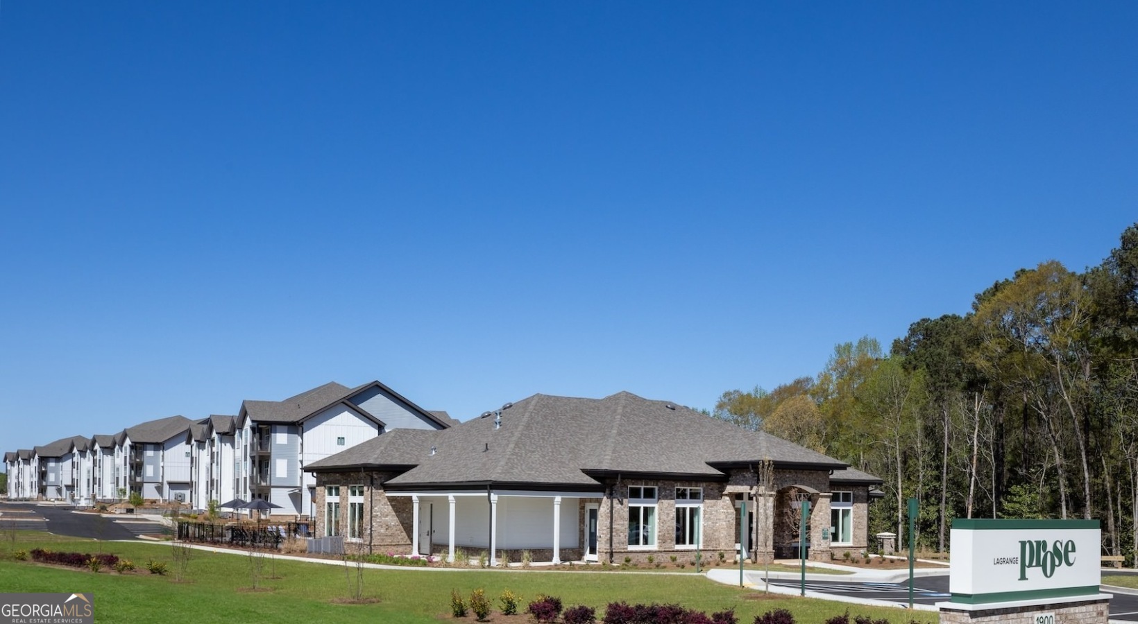 front view of a big house with a big yard