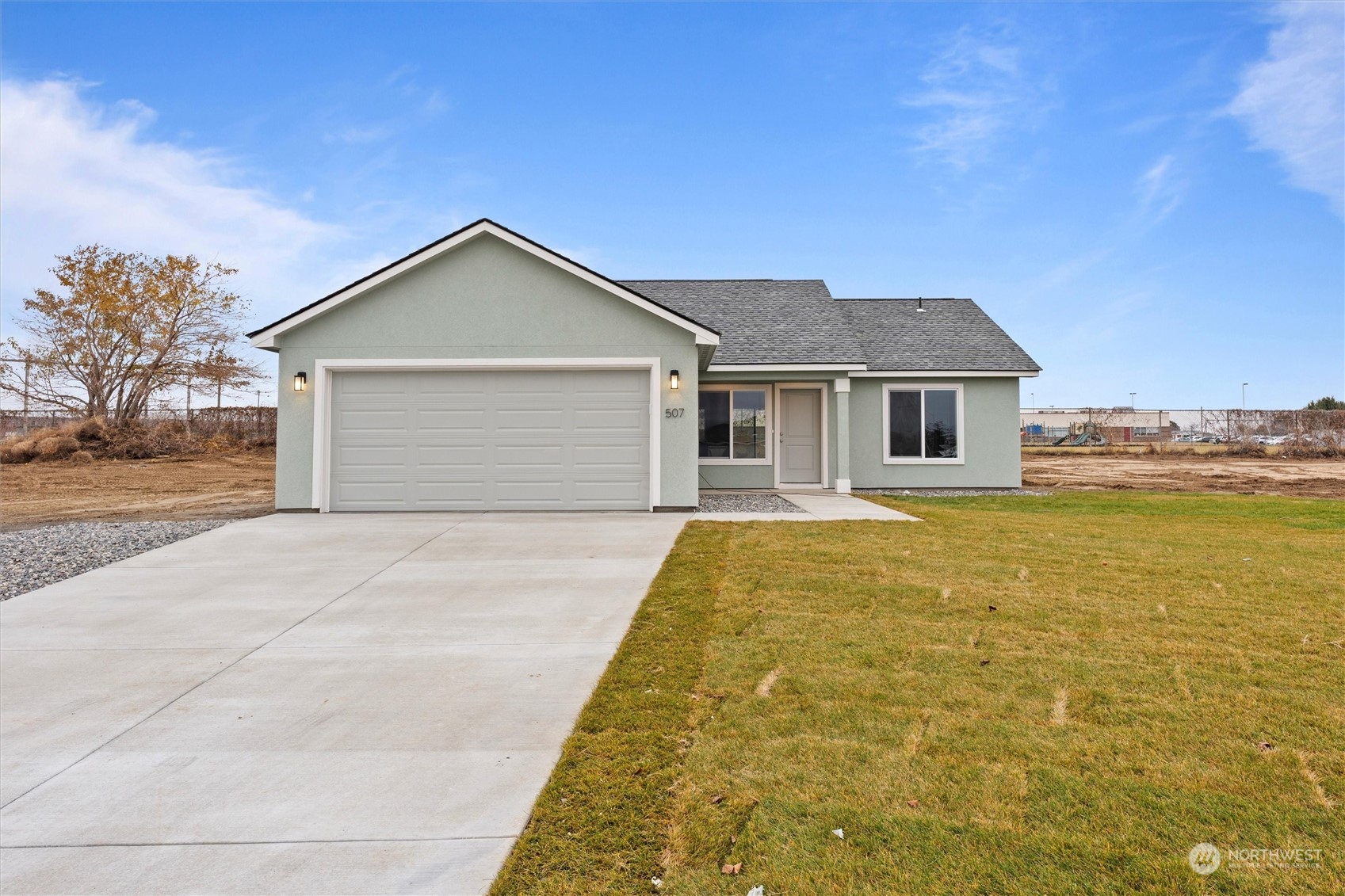 a view of a house with a yard