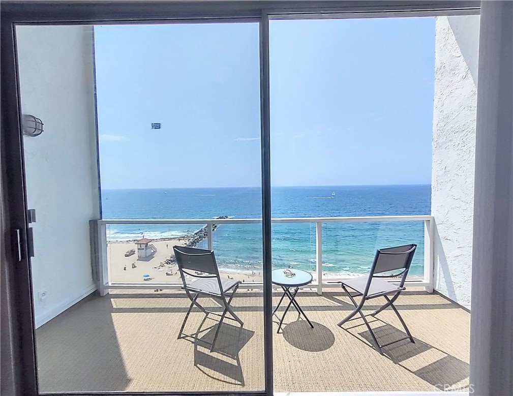 a view of a chairs and table in the terrace