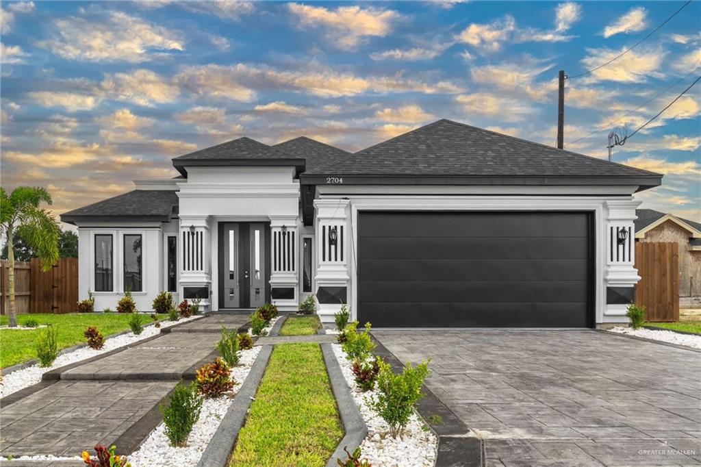 View of front facade with a garage