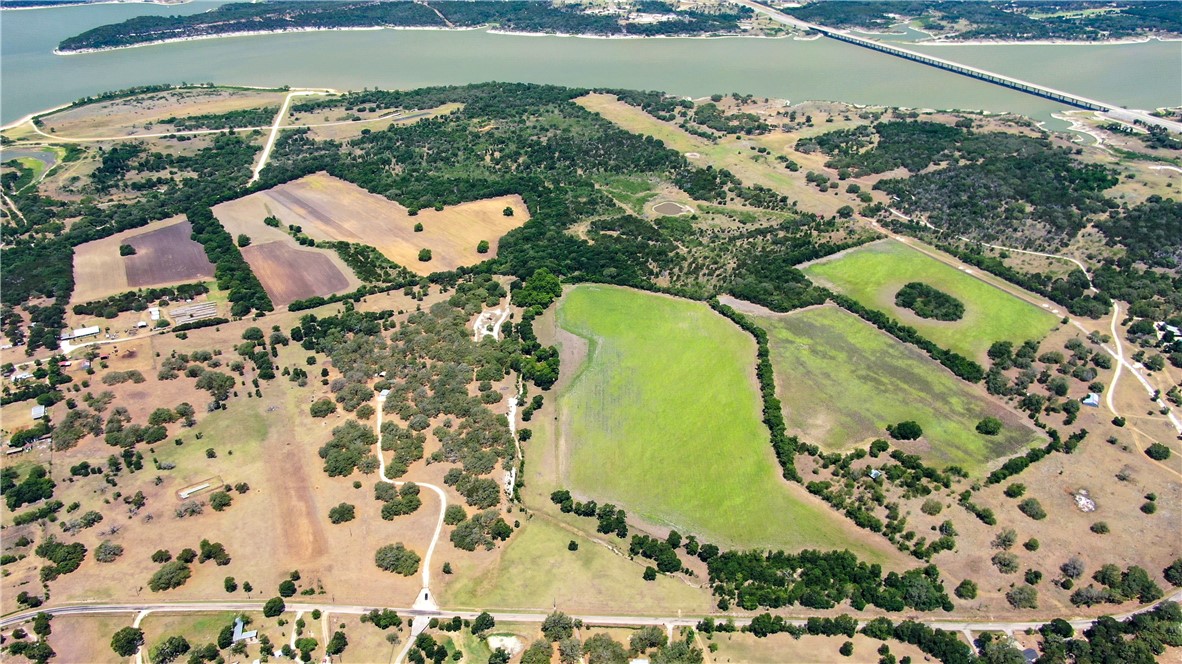 an aerial view of a house with a lake view