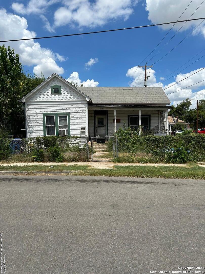 a front view of a house with porch