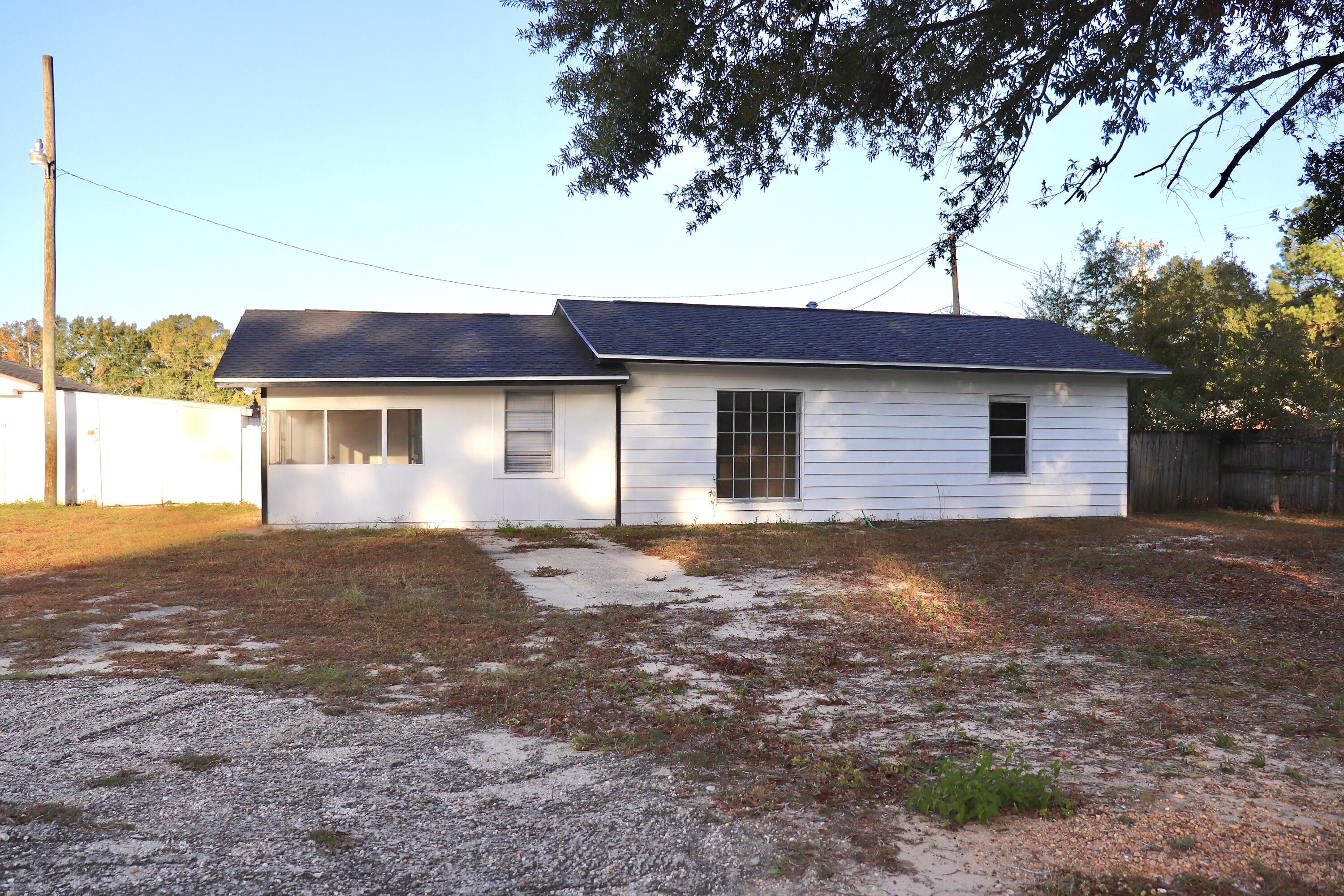 a view of house with outdoor space