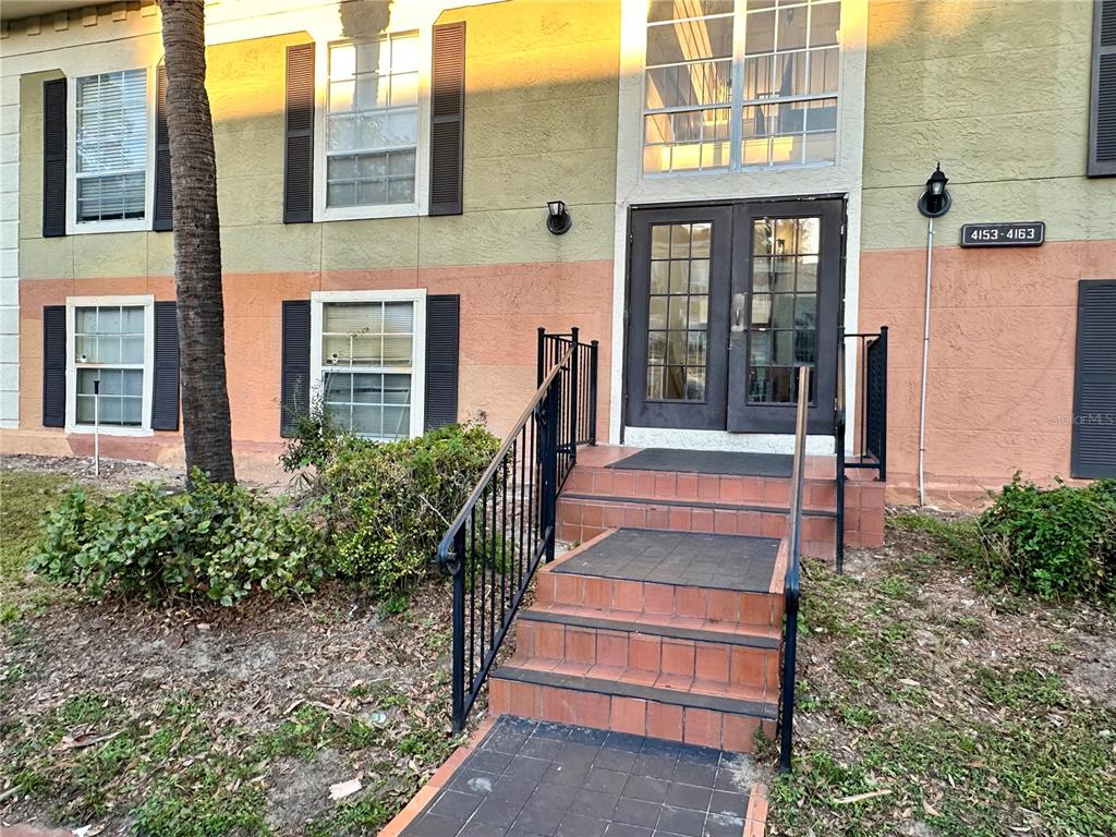 a front view of a house with a porch