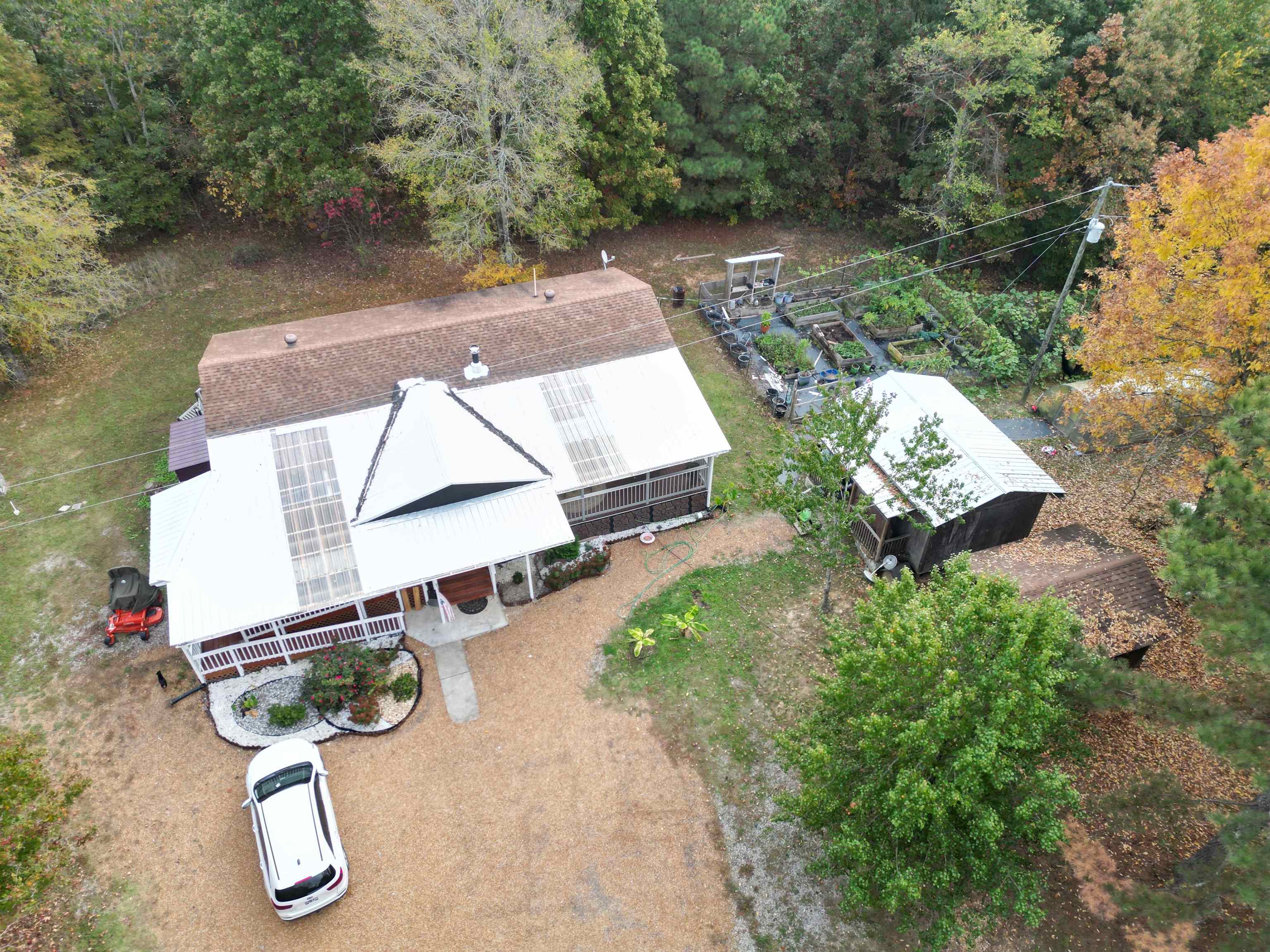 an aerial view of a house with outdoor space