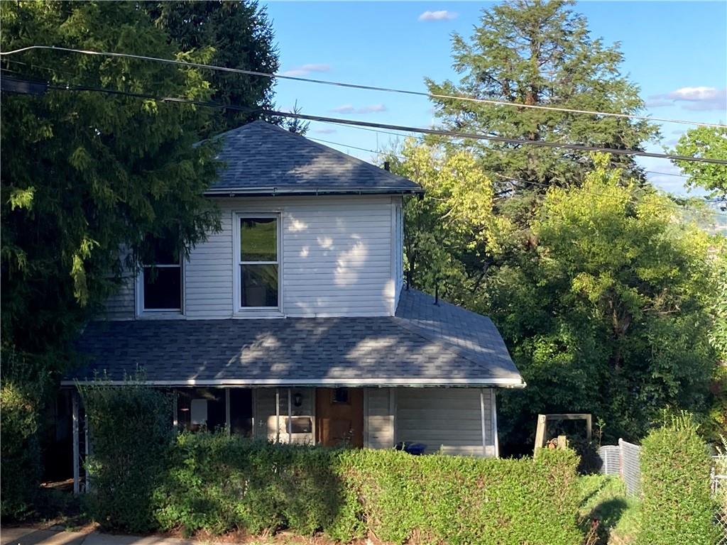 a front view of house with yard