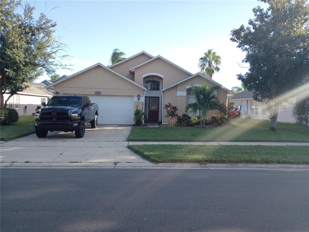 a car parked in front of a house