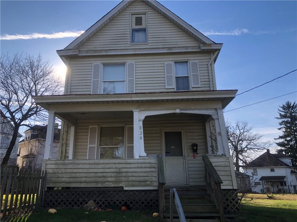 a front view of a house with parking