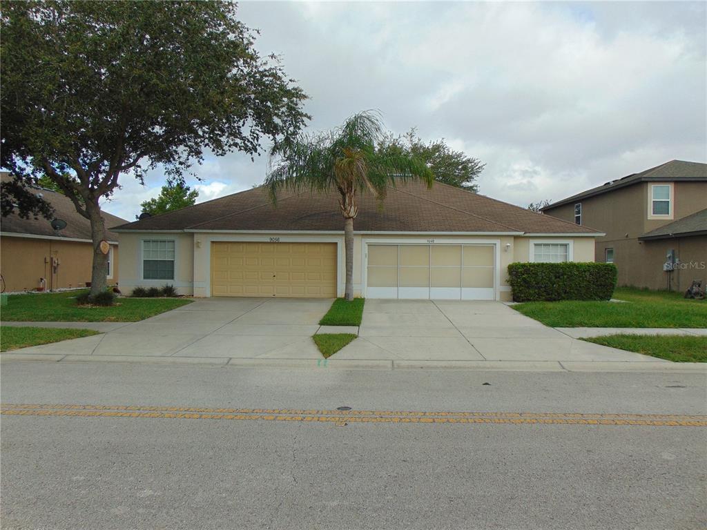 front view of a house with a street