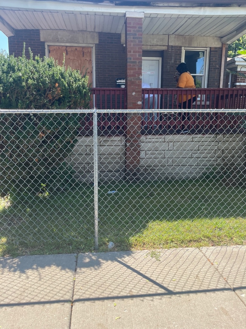 a outdoor view of a house with a backyard