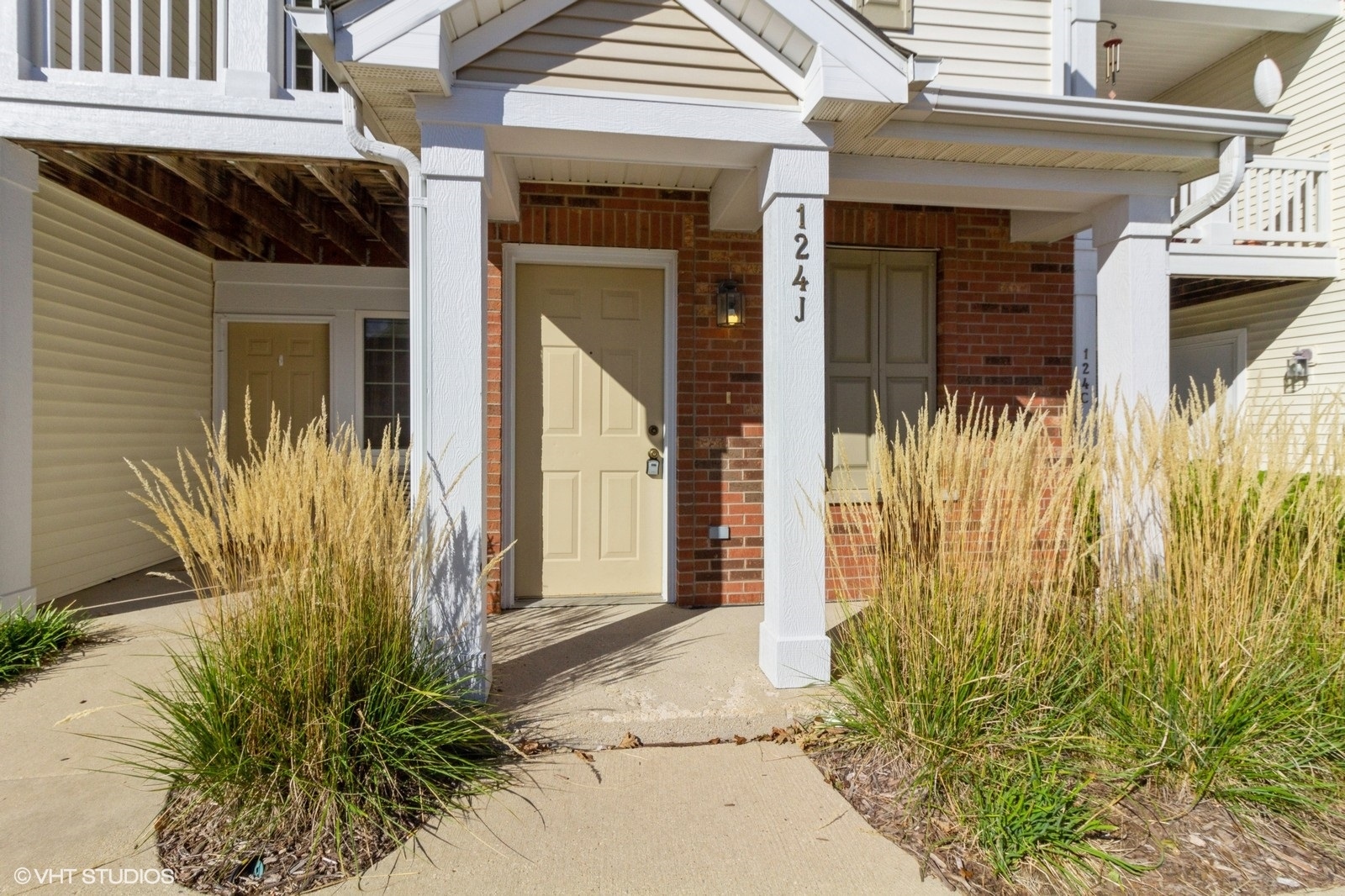 a view of a house with a small garden