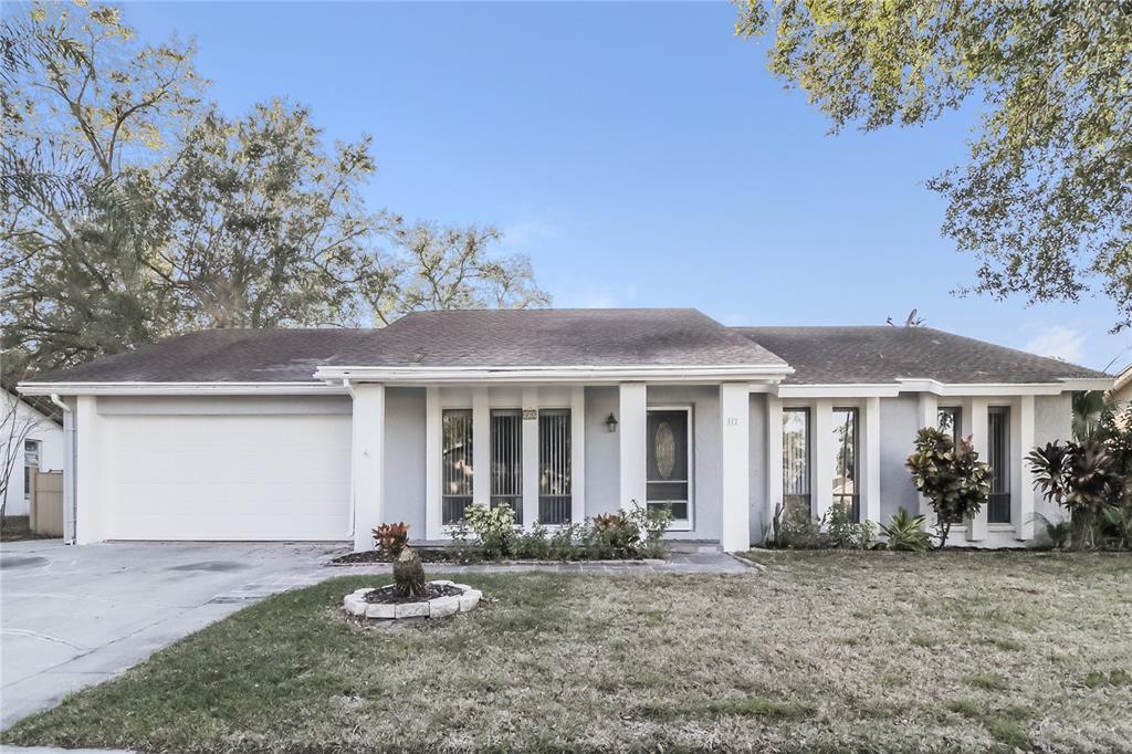 front view of a house with a yard