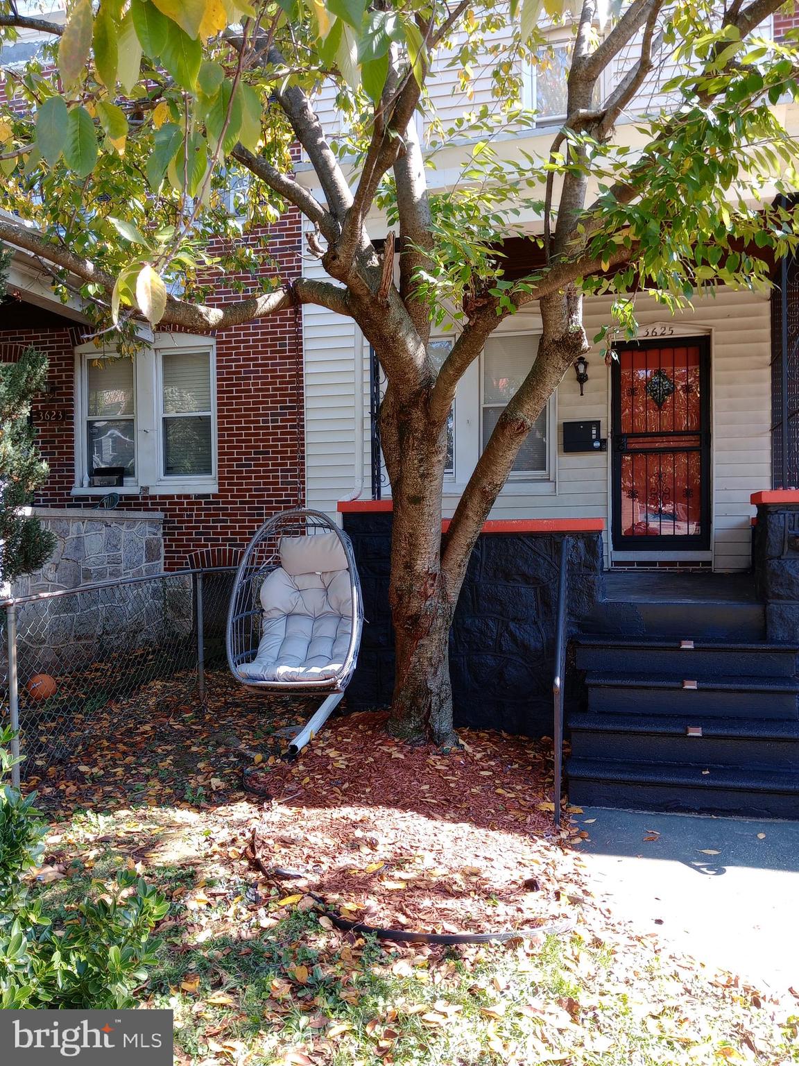 a view of a backyard of a house