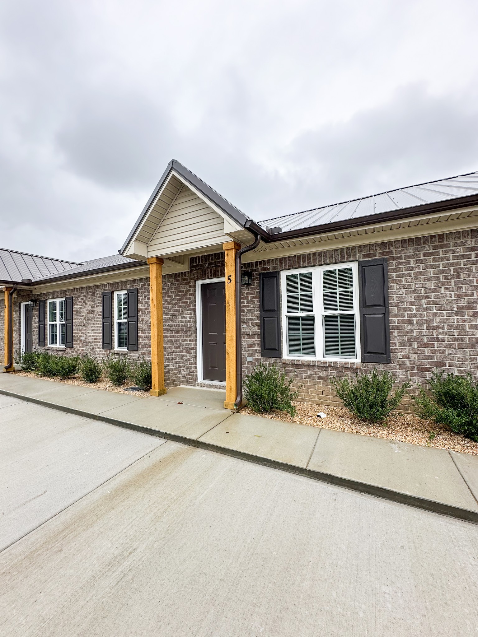 front view of house with a yard