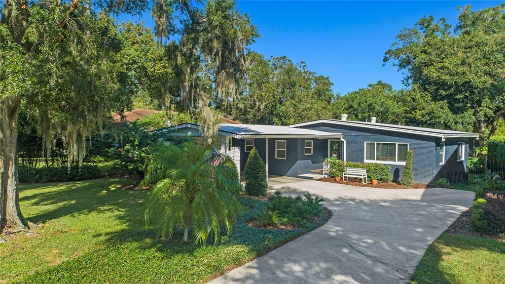 Beautifully renovated mid-century modern LAKEFRONT home on 1/3 of an acre lot