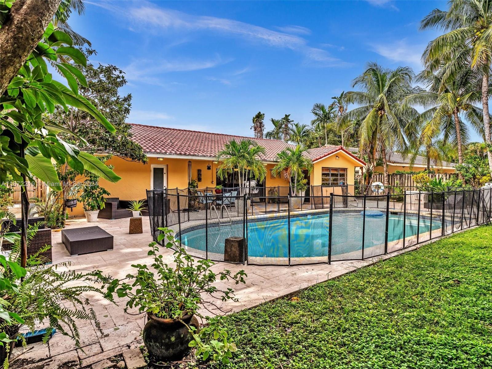 a view of a swimming pool with a patio