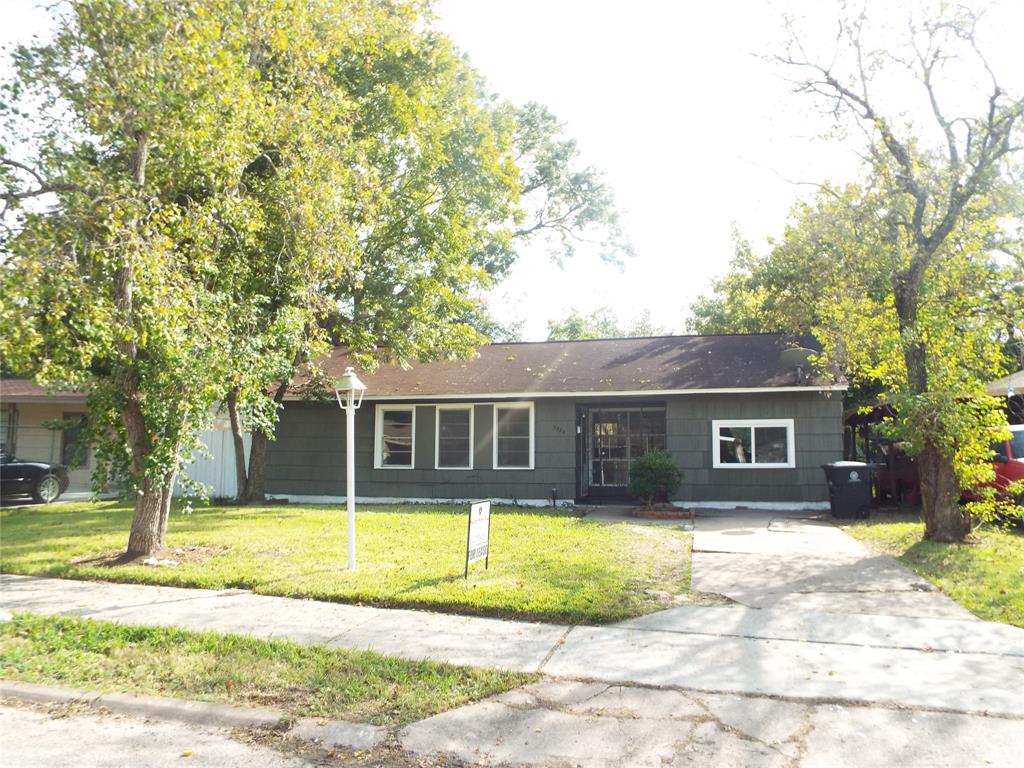 a view of a house with a swimming pool