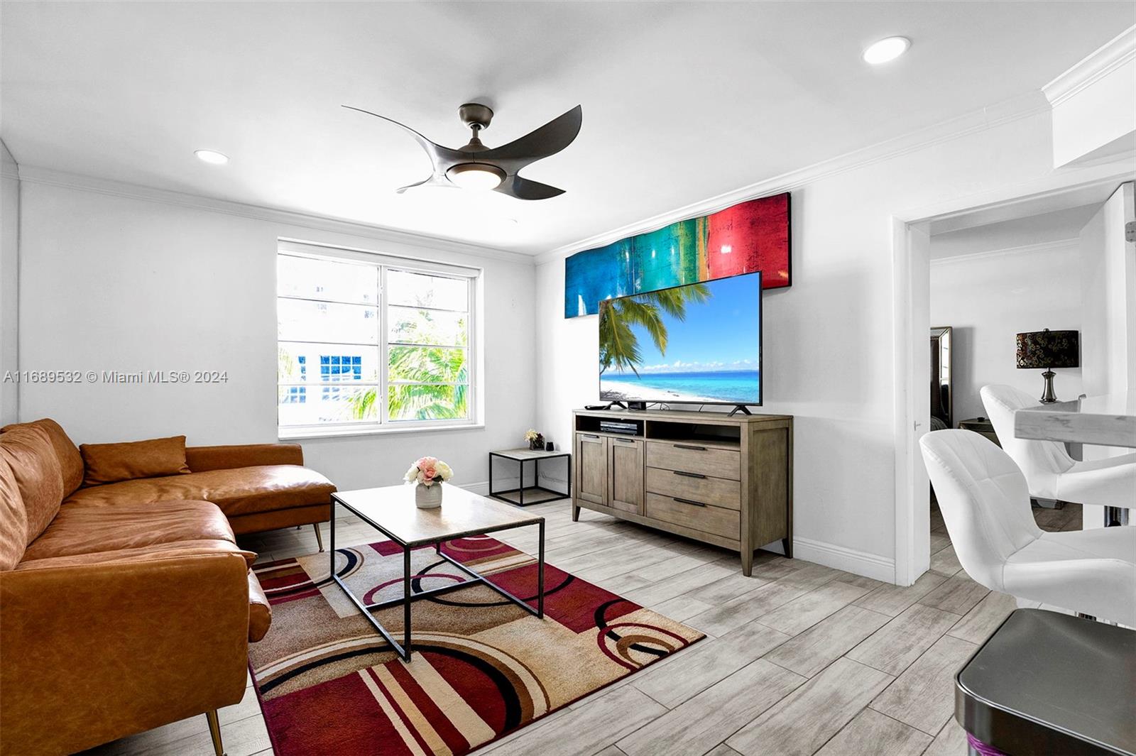 a living room with furniture and a window