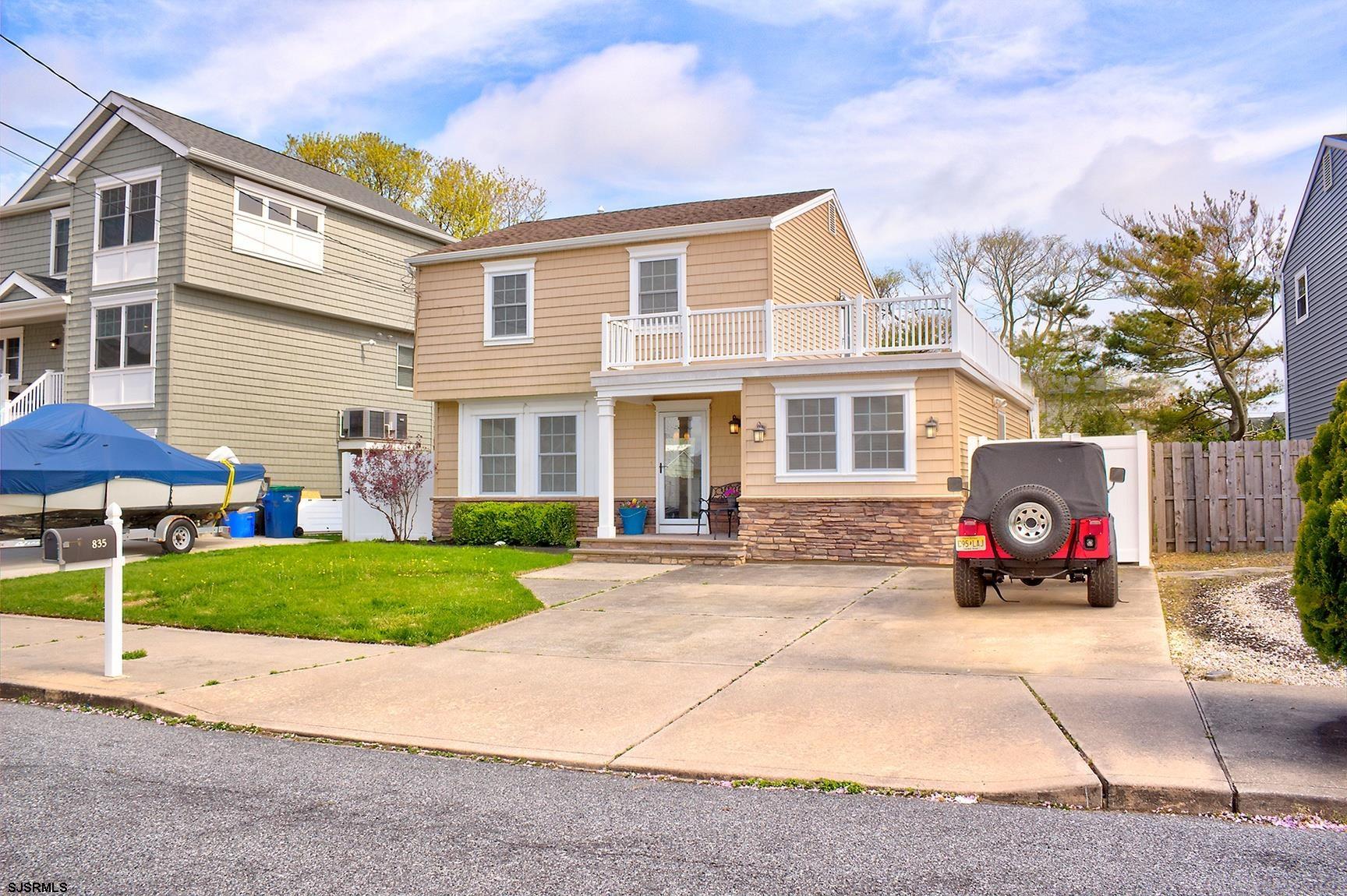 front view of a house with a patio