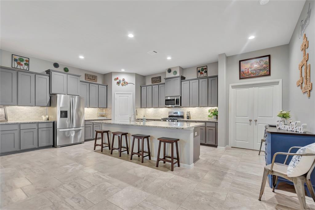 Look at this kitchen! What a great space to cook, gather or entertain!