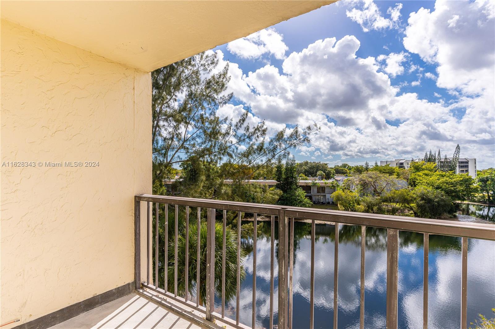 a view of balcony with wooden floor