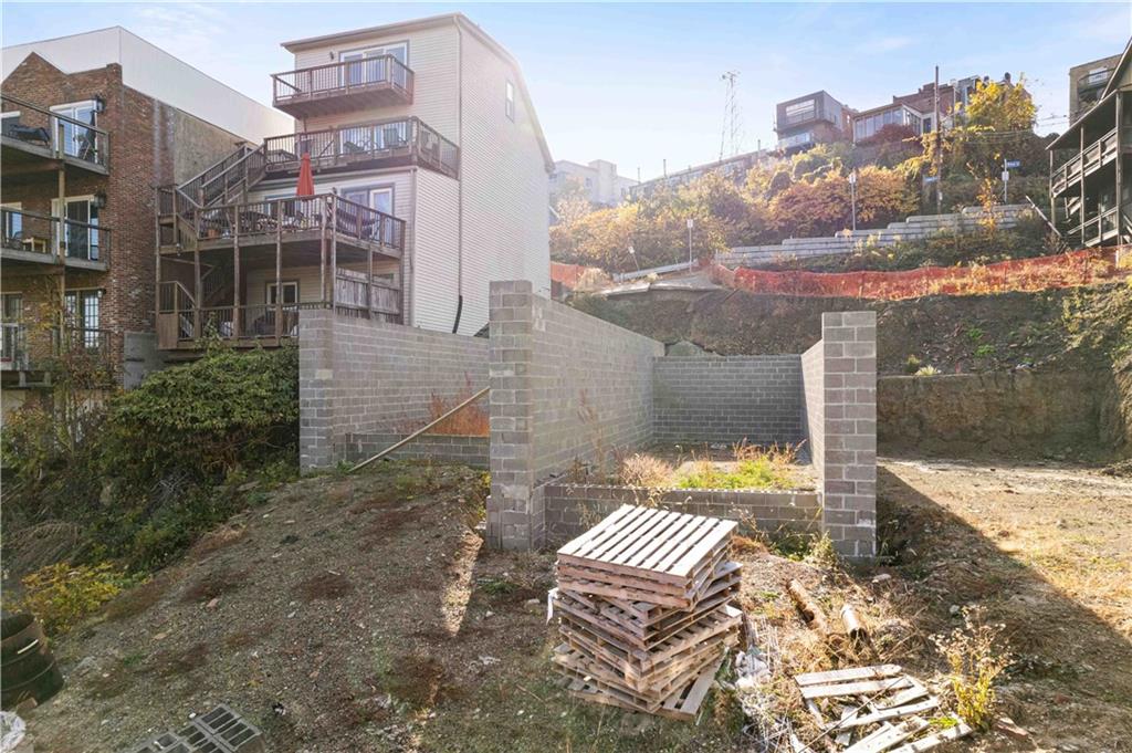 a view of a patio with a yard