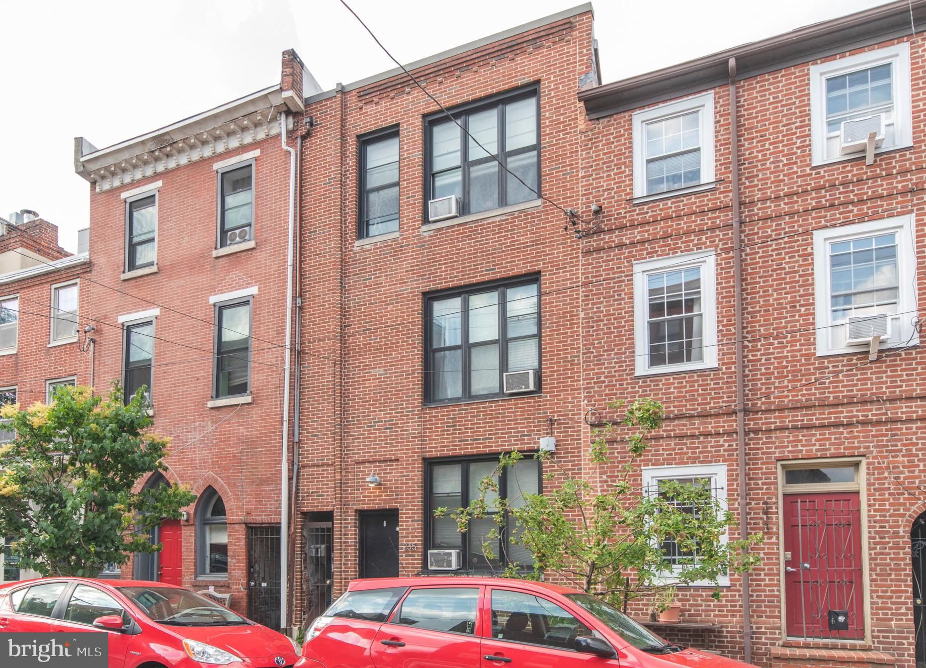 a front view of a multi story residential apartment building