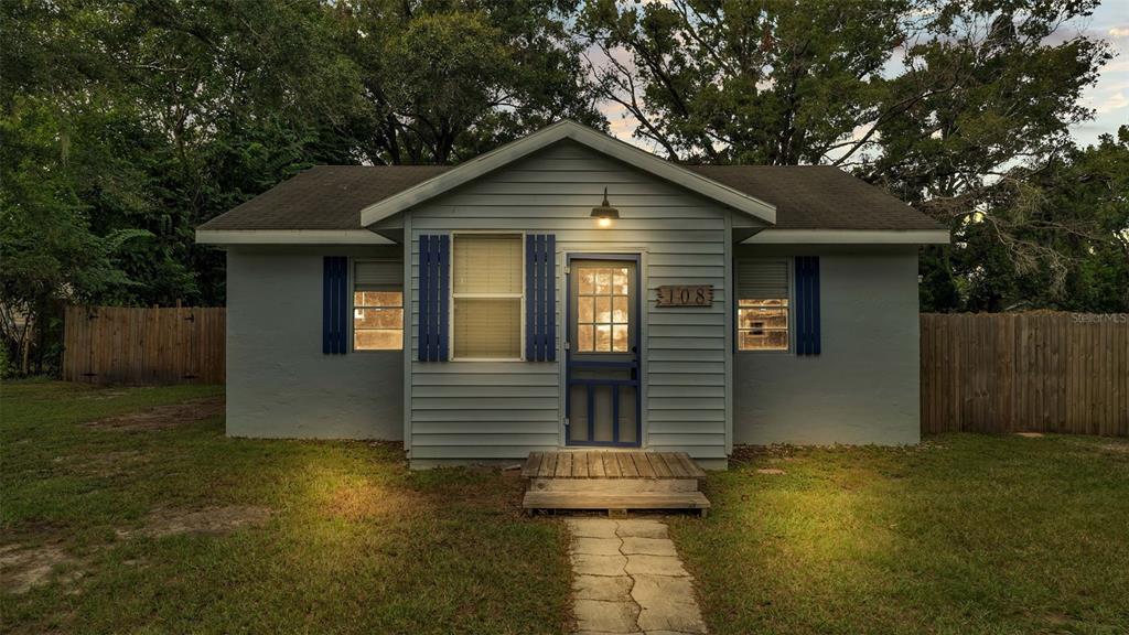 a front view of house with yard