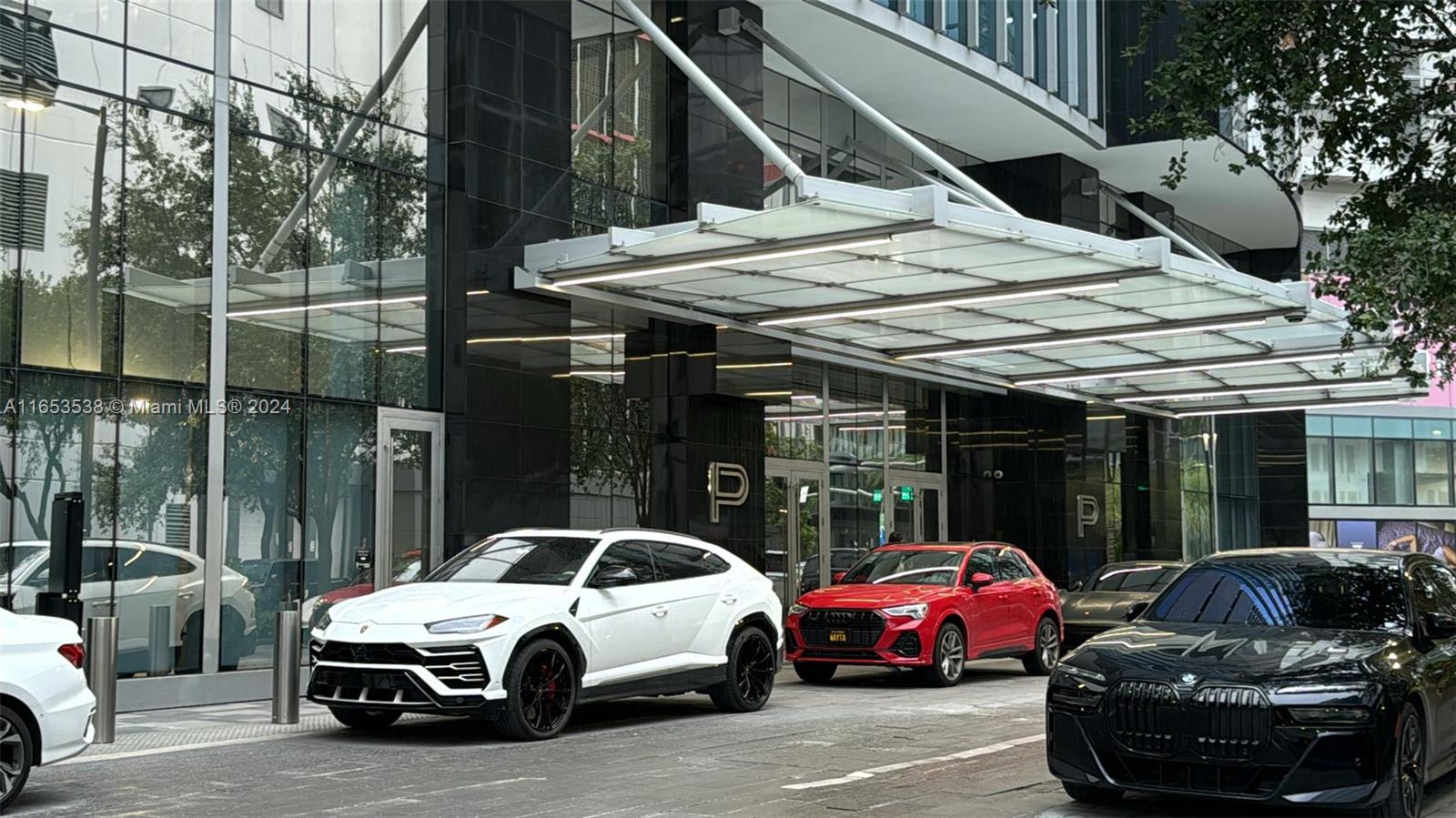 a view of a car parked in front of house