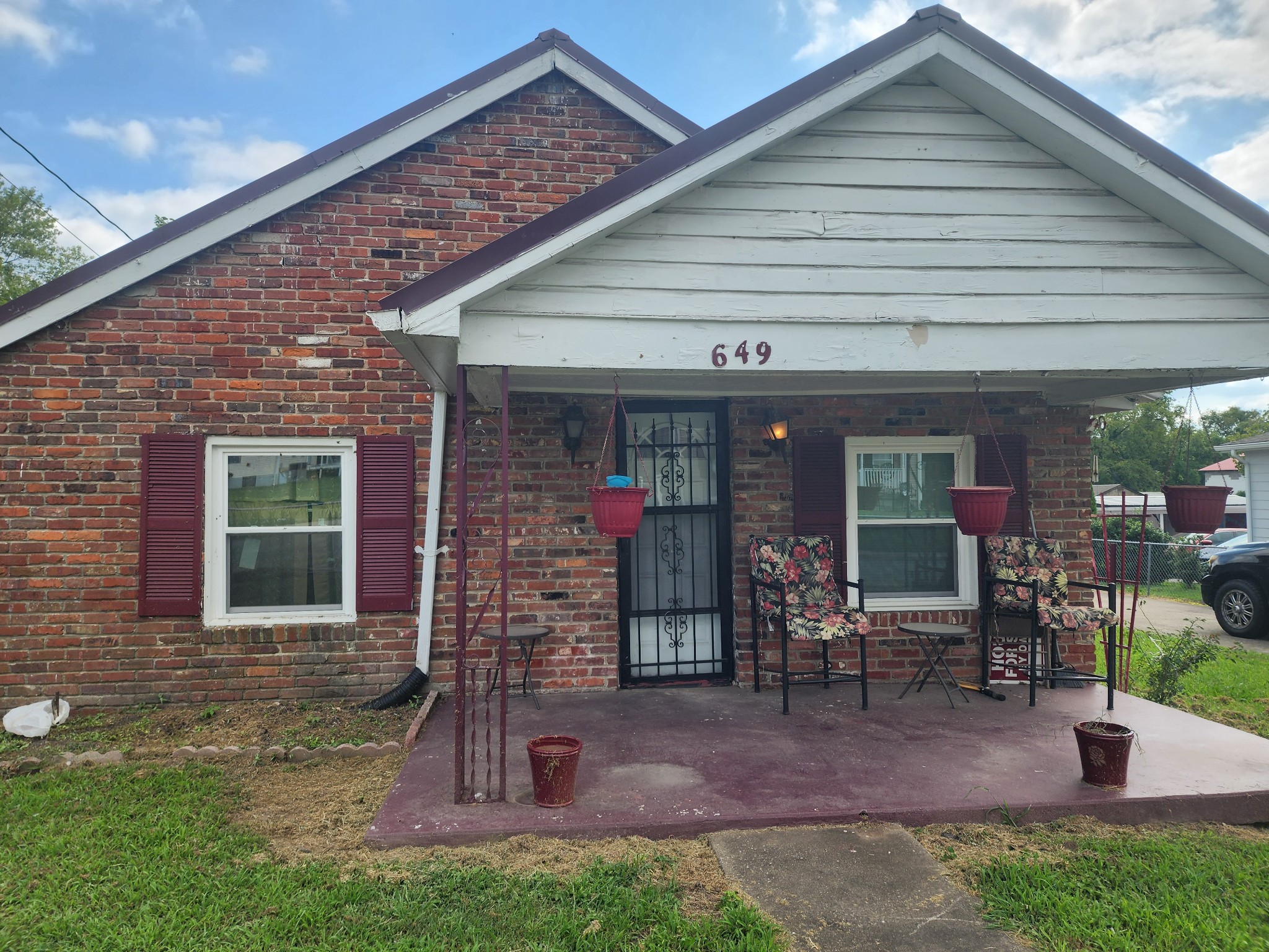 a front view of a house with patio