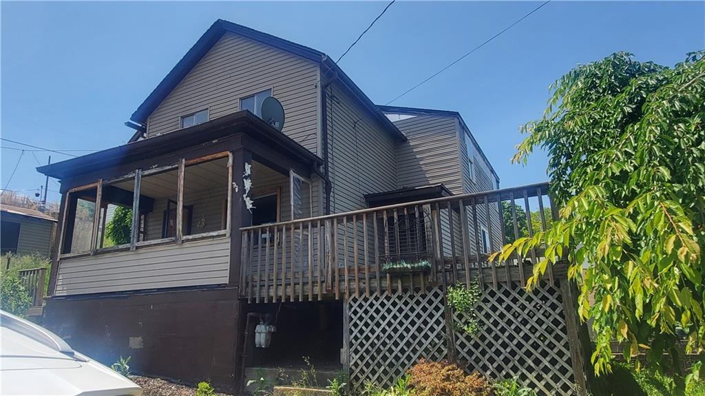 a view of a house with a deck