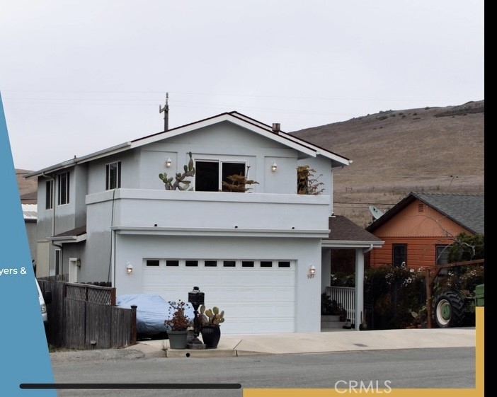 a front view of a house with a porch