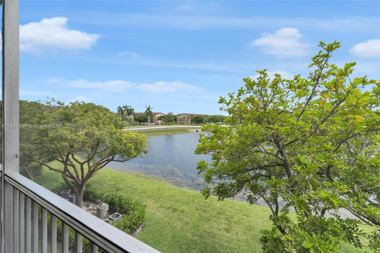 a view of a lake from a balcony