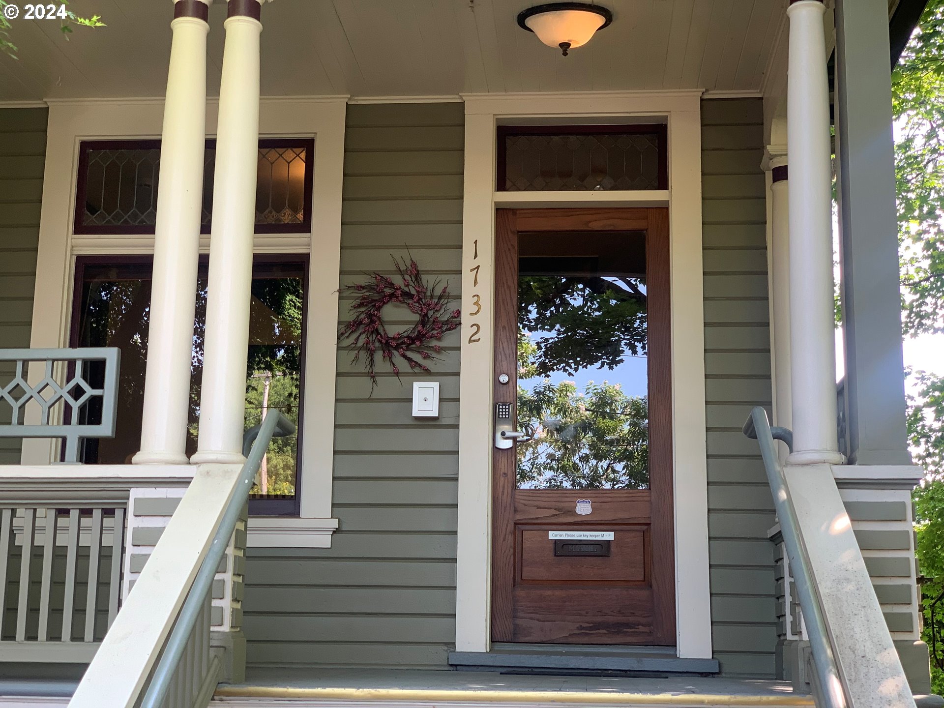 a view of a entryway door front of house