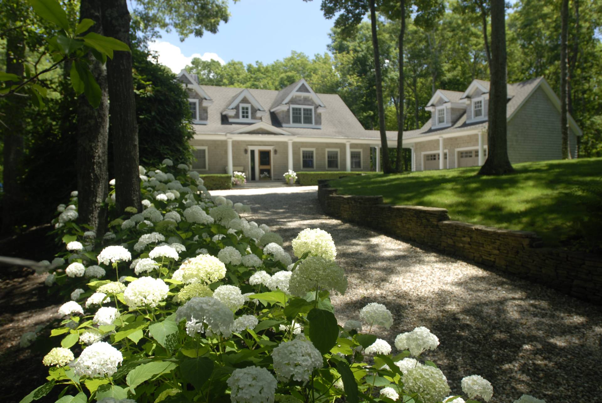 a front view of house with garden