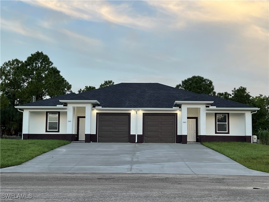 front view of a house with a yard