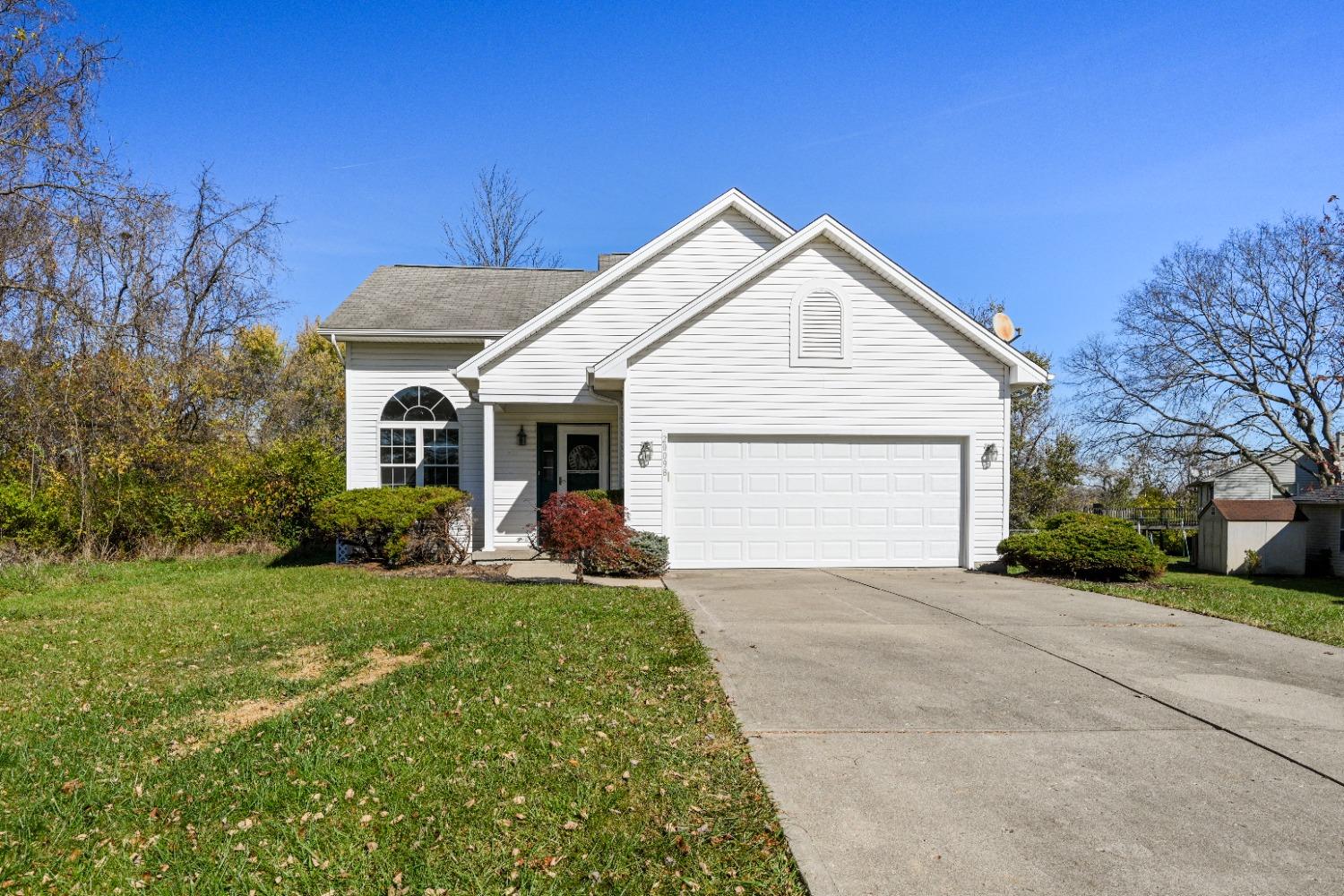 Level driveway and level back yard - rare find in HVL!