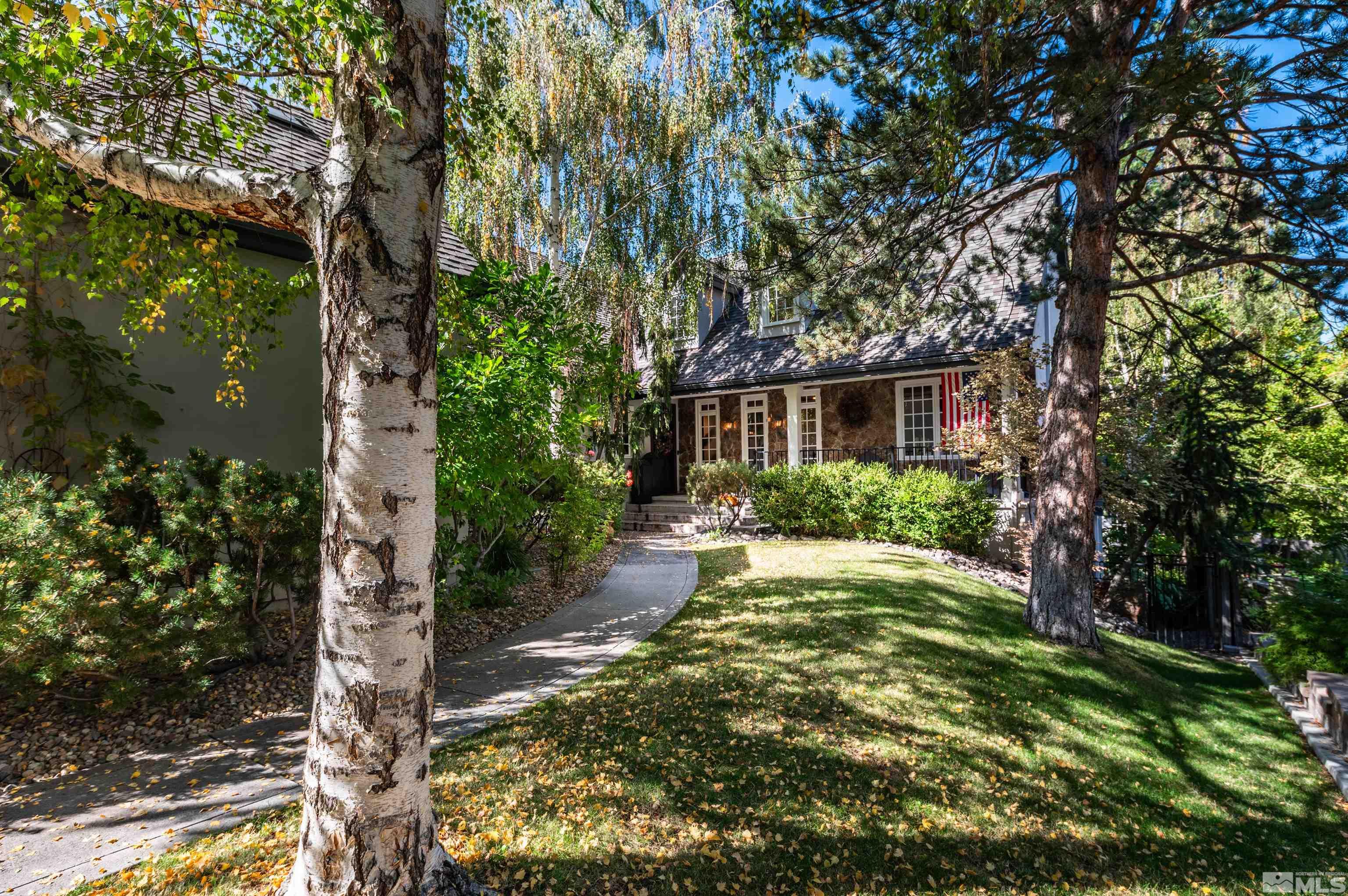 a view of a yard in front of house