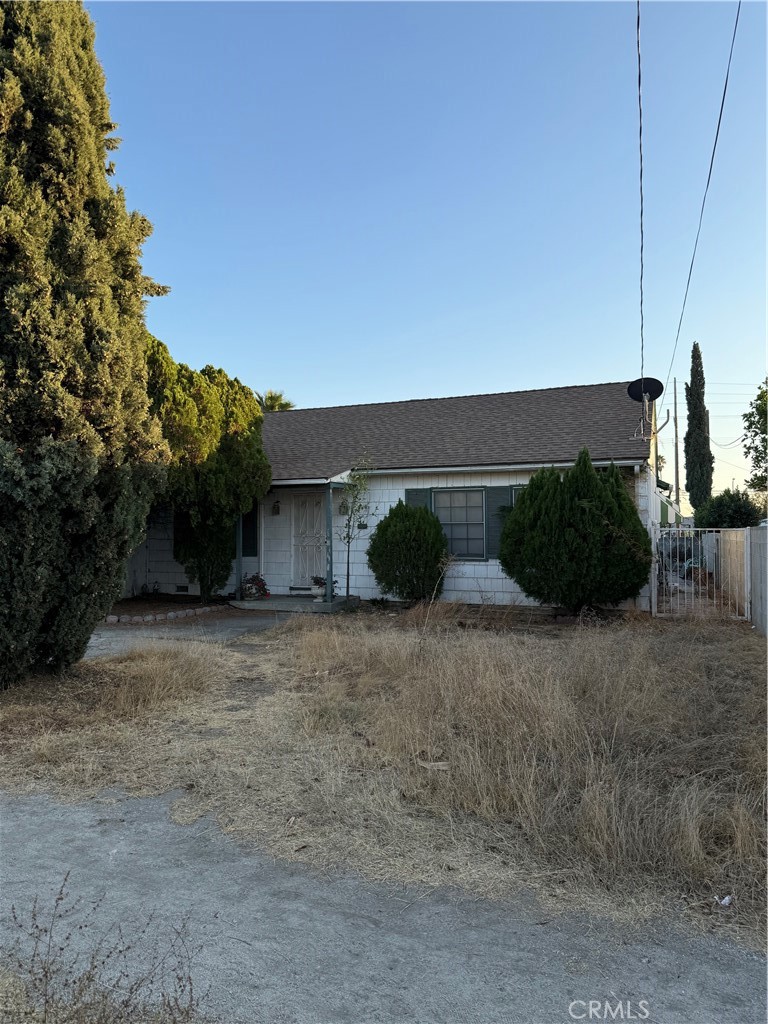 a view of a house with a street