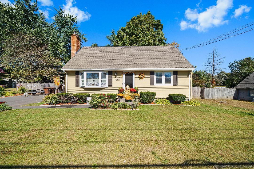 a house view with a garden space