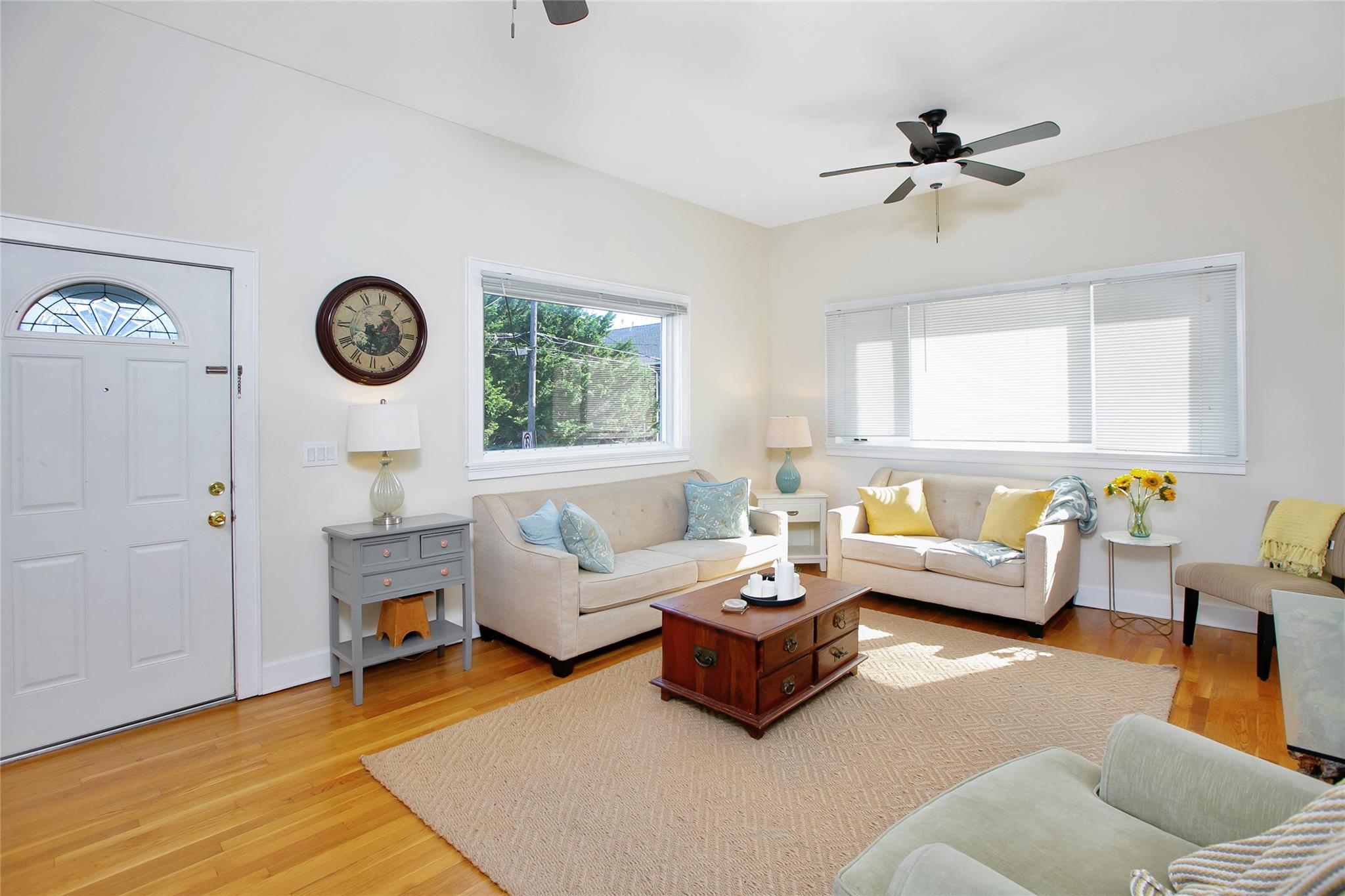 a living room with furniture and a window