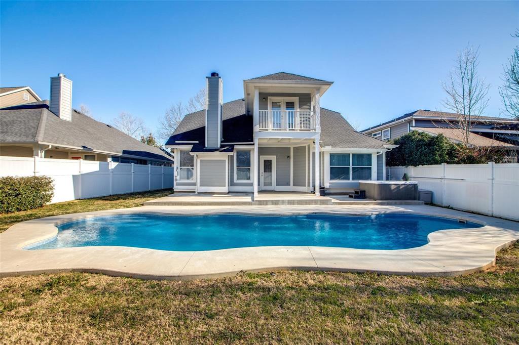 a view of a house with swimming pool