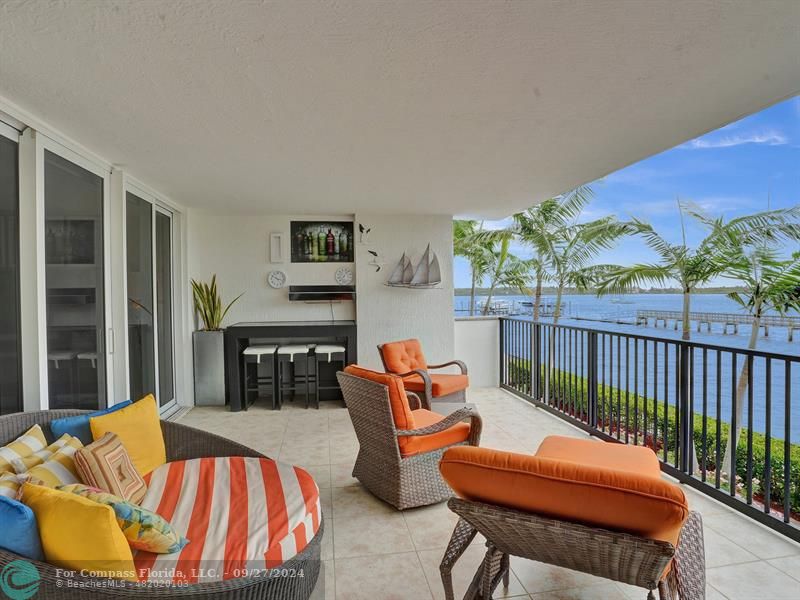 a outdoor living space with furniture and a garden