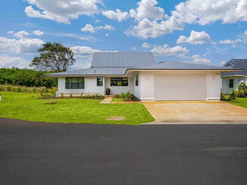 a view of house with yard